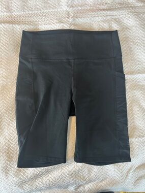 Fabletics Black High-Rise Bike Shorts with Side Pockets
